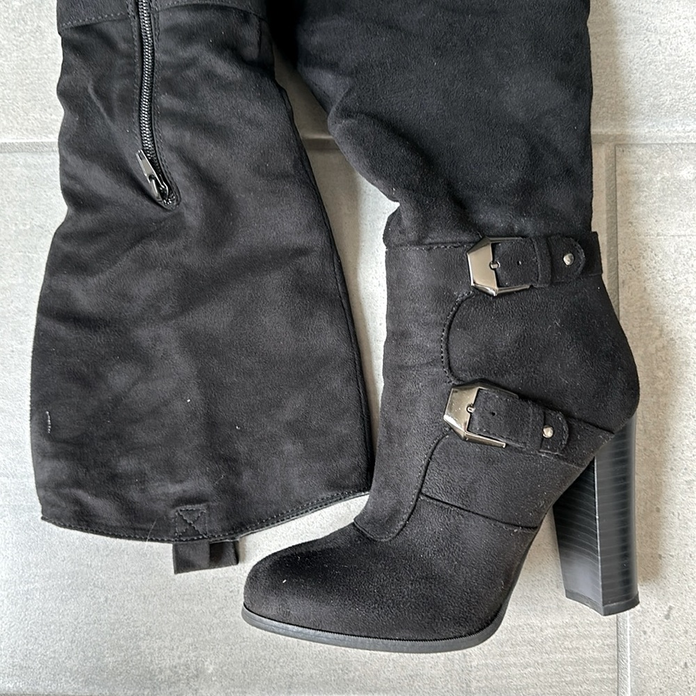 Black, size 5.5 heeled boots.